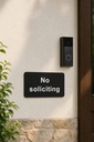 07-no-soliciting-sign-under-doorbell